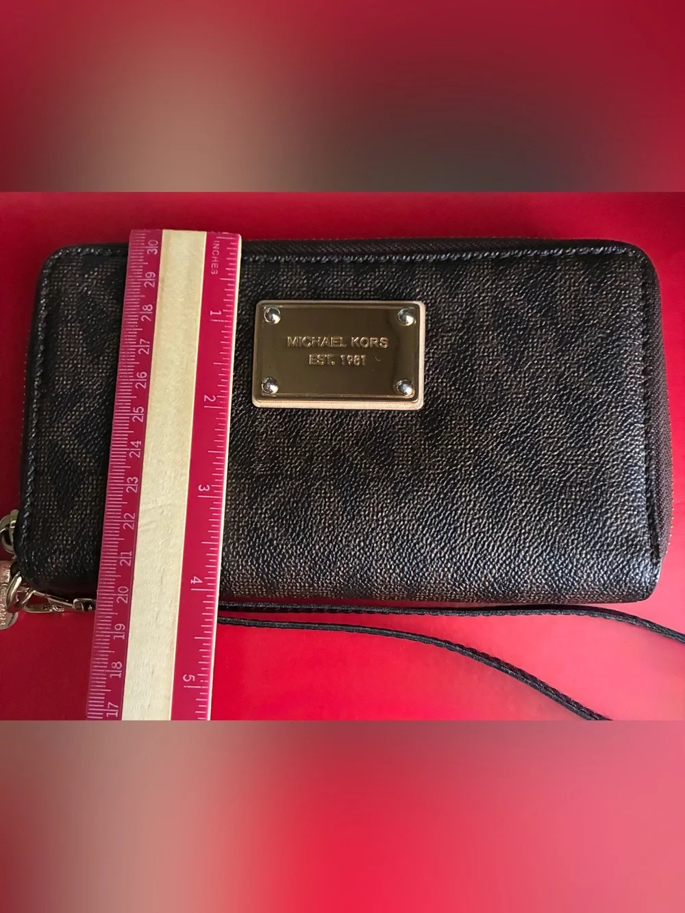 Michael Kors Black and Gold Logo Wristlet